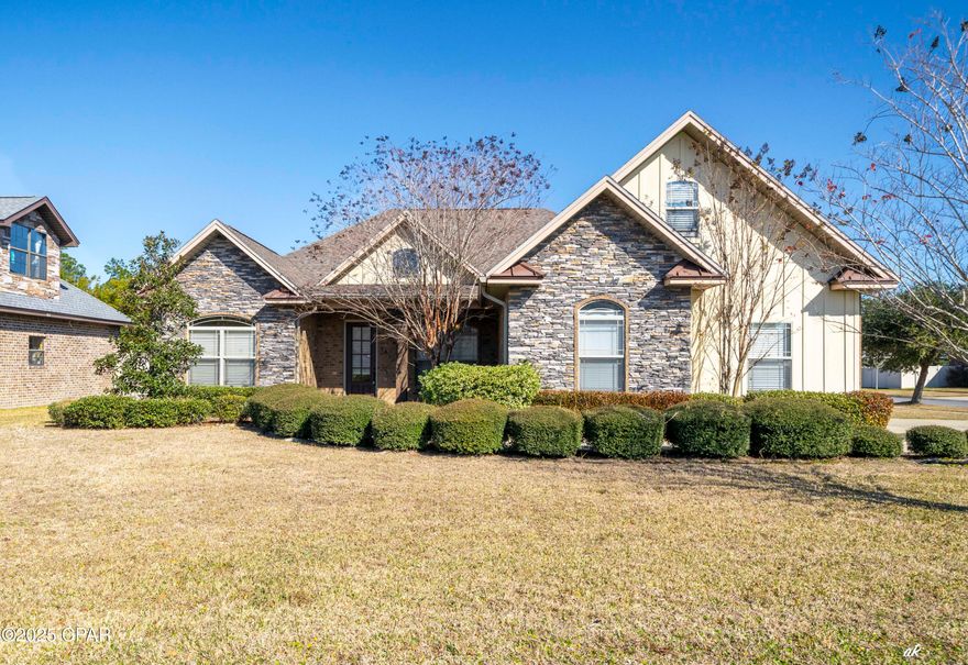 Don't MISS this opportunity to own a beautiful custom home on a corner lot in the highly desirable Hawks Landing subdivision. It features 4 bedrooms with cedar lined closets, 4 full bathrooms, and a large bonus room upstairs. This home has an open floor plan, hardwood floors, ceilings are 9' and 10' high throughout with crown molding and built in bookcases on both sides of the fireplace in the family/living room. The gourmet kitchen features custom cabinets, granite counter tops, stainless steel appliances and a beautiful backsplash. The home has a spacious, screened back patio and a fenced back yard. The home is wired for a generator, and the garage has heavy duty cabinets for extra storage. Dimensions are approximate. Please verify if it is important. Contact your favorite REALTOR today and come take a tour of this home!