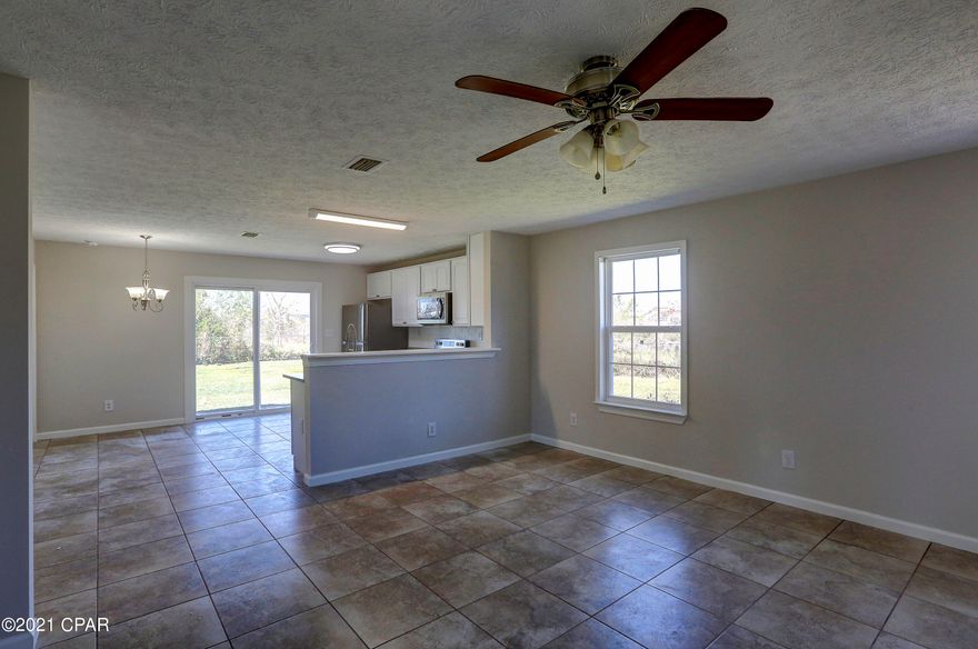 Hurry, this house won't last long! 3 bedrooms, 2 bathrooms with bonus room, centrally located near schools and shopping.  House features full kitchen with stainless steel appliances, tile flooring and carpet in bedrooms. Living room has a convenient desk nook and home has plenty of closets throughout. Bonus room can be used as as extra bedroom, living space or game room. 

All sizes are approximate and should be verified.