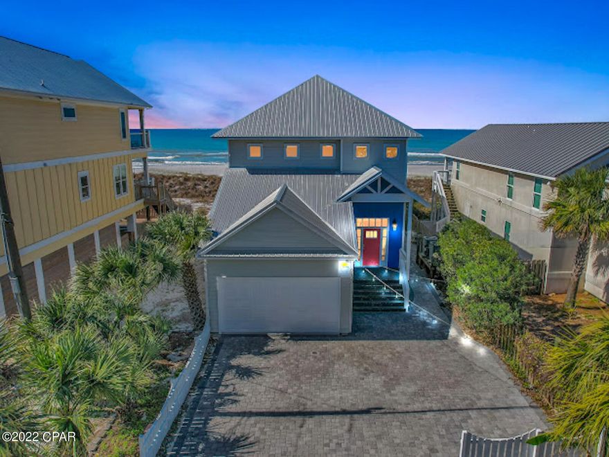CURRENTLY UNDER CONTRACT; SELLER ACCEPTING BACKUP OFFERS

RENTAL HISTORY OF $180K+ in 2021***** Coined ''Peach on the Beach'' due to its charm and likeably, this spectacular waterfront Beach home has unobstructed, panoramic views of the Gulf of Mexico.  With 4 bedrooms, 4 bathrooms, and 3 separate entertainment spaces, this popular vacation rental is ideal for the vacationer seeking privacy, comfort, recreation, as well as leisure.  Want to have a beach day? Exit through the back French Doors on the first floor, take the newly installed exclusive, private beach walkover, and you are just a few steps away from the crystal white sands of Panama City Beach.   Want to stay in? Enjoy the swim-spa on the back deck or cozy up next to the fireplace with a great book.  Want more entertainment space? Head to the fully heated and cooled recreational room for a game of ping-pong, darts, and foosball or rest on the couch while watching your favorite sports team. This additional space is also ideal for accommodating large groups with children.  The beautifully designed kitchen is open to the main living area and features white custom cabinetry, blue arabesque backsplash, granite counter tops, microwave/oven combo and gas stove. This beach house can sleep up to 16 guests comfortably and features 2 bedrooms and 2 bathrooms downstairs and an additional 2 bedrooms and 2 bathrooms upstairs. The oversized custom paver driveway is perfect for accommodating several vehicles.  Head upstairs and you will find another living area known as the bunk room featuring additional space for guests and a wet bar with a mini refrigerator.  Take in the waterfront views from the private master suite upstairs featuring a large walk-in closet as well as French Doors leading out to the upper balcony.  The master spa is spacious and features a double vanity, garden tub, and white subway tiled shower.   A new roof was installed in 2016 and the exterior of the home was remodeled in 2019.  "Peach on the Beach" is located in Flood "X" which does not require flood insurance; however, the current owner does have an affordable flood insurance policy that is fully transferrable.  There is also no HOA which means no frivolous HOA fees! Schedule your private viewing today to enjoy this delightfully decorated beach house and the picturesque landscape.