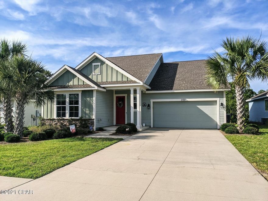 Under Contract - Taking Backups the phrase 'CURRENTLY UNDER CONTRACT, SELLER ACCEPTING BACKUP OFFERS. Come home to this stunning 4 bed, 3 bath home in the highly sought-after community of Whisper Dunes, just minutes from the beach, Pier Park, and 30A. Perfectly positioned with no neighbors behind and close proximity to the pool. The open floor plan on the main level features tile throughout and a beautifully crafted kitchen with stainless steel appliances, large island, and upgraded kitchen cabinets. The master suite boasts a tray ceiling in the bedroom and a bathroom equipped with double vanities, garden tub, separate shower, and walk-in closet. Two additional rooms are located at the front of the house, separated by a full bath and linen closet.