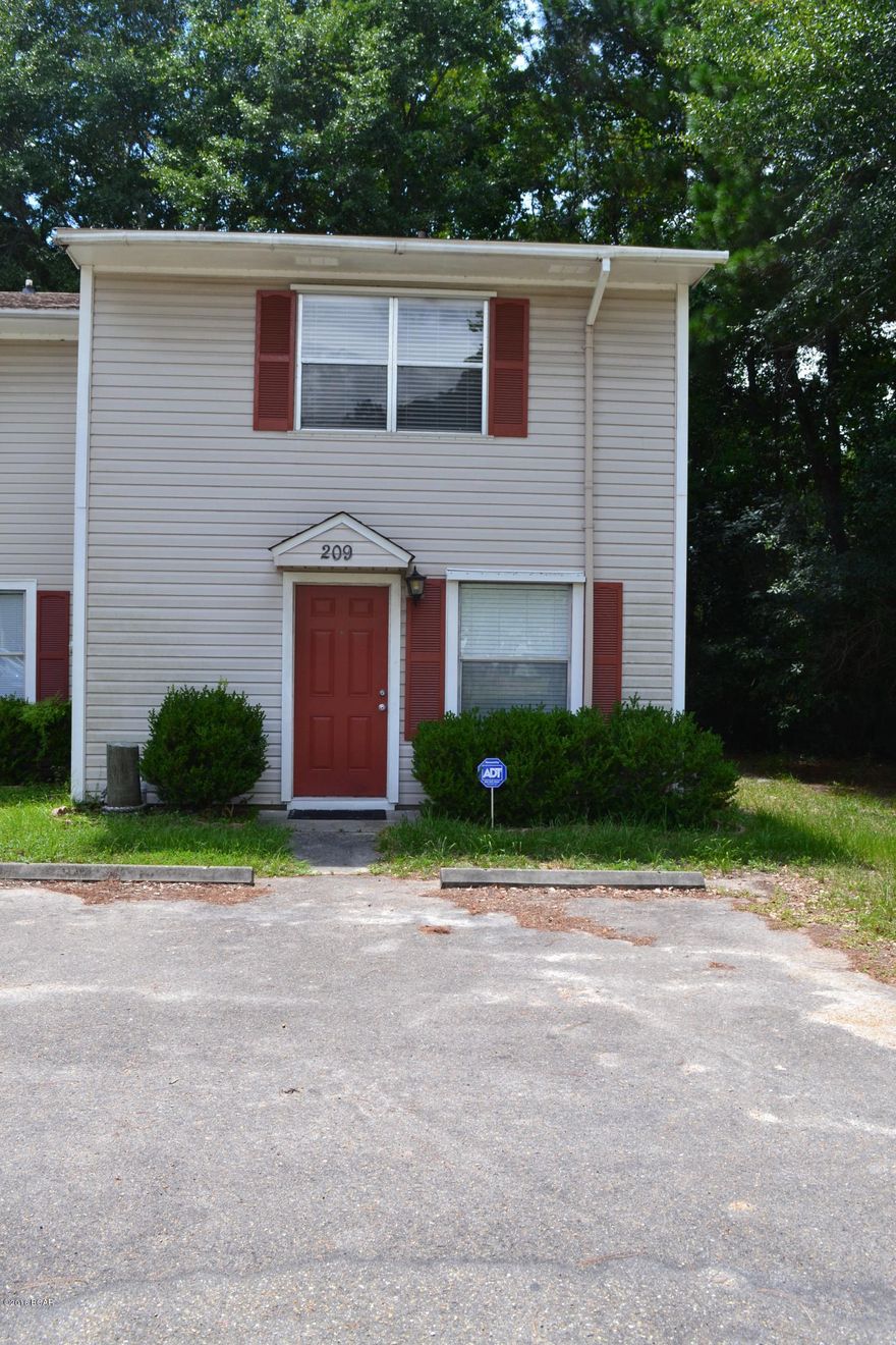 ****Just Reduced $5000****Rural Housing Friendly Area!  Absolutely wonderful renovated end unit townhome that will make a perfect home or investment property. At this price it should easily cash flow. This property is in great condition with a new roof installed in 2015 (still under warranty), New 2.5 ton 14 Seer heat Pump complete system with air hander installed 5/2016 (under warranty), and a new water heater installed 08/2016. Since purchasing the property in  2010 the sellers have replaced all flooring to include new carpet and painted all rooms excluding kitchen and baths, replaced the front door, new refrigerator, stove, dishwasher, a new back sliding door with security film, corrugated steel hurricane shutters that cover windows, all new lights, ceiling fans, interior switches,outside security light in the back of the home, with a front light on a timer. The downstairs features a 12x18 living room with sliders leading to the back covered porch with an 6.5x7.5 attached storage. The kitchen and dining area are open to the living room, and there is also a laundry room and half bath, plus additional storage below the stairs. The upstairs features a master bedroom with double closets and an oversized window looking out to the backyard, and the additional room features an oversized window looking out to the front yard. The full bath is set up as a Jack-and-Jill and accessible from both rooms.   This home is NOT in a flood zone, but located in "X".  Additional Features include: wood blinds, security system, covered patio.   If this sounds like the property you have been waiting for, make an appointment today to view! Age, Sq.Ft., Room Dimensions, Schools, Taxes, Lot Size, or any important information is an estimate and must be verified by the buyer if important.