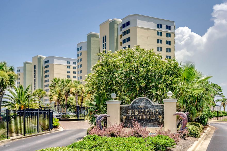 CURRENTLY UNDER CONTRACT ... ACCEPTING BACKUP OFFERS.  Hibisus by the Bay ... on St. Andrew's Bay ... gated upscale community with twin towers.  Tower I ... 3/2 w 2,022 SF ... corner unit with wrap around balcony ... water view from all rooms.  Absolutely awesome panoramic views of beautiful St. Andrew's Bay! Just minutes by car or boat to Gulf of Mexico.  Situated within a few minutes drive to Pier Park, shopping, dining, entertainment, etc.  Complex offers amenities galore!  Transaction includes single car garage. Reasonable HOA fees paid quarterly.  On site management (CAM).  Measurements should be verified for accuracy.