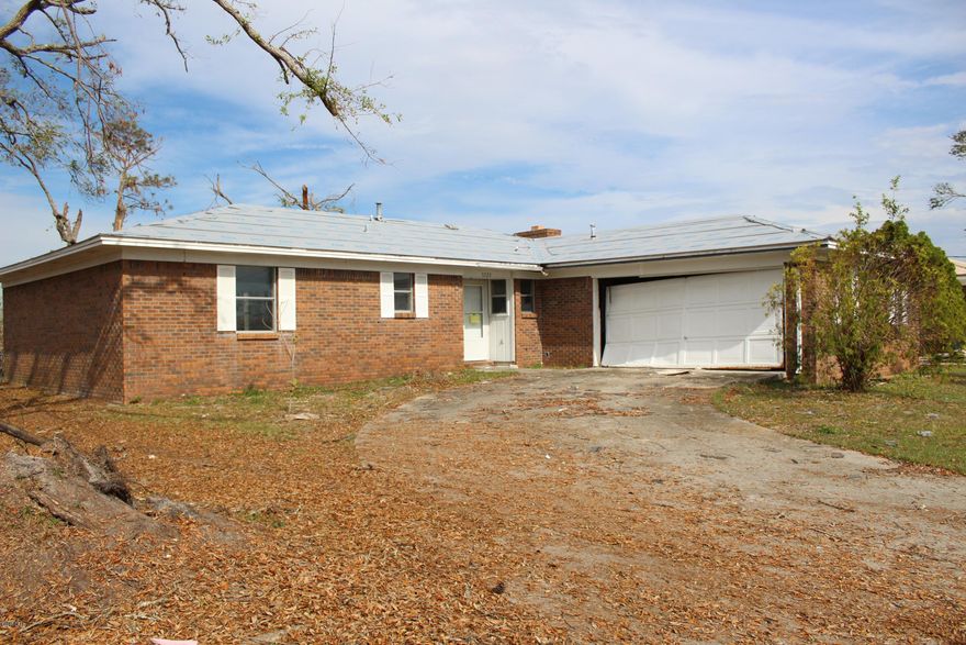 Home is in a great location and neighborhood. This is a handyman special. 3 bedroom 2 bath home survived Hurricane Michael with little water damage. The roof received some damage, but interior stayed dry, all the ceilings and walls are intact. Home needs refreshing.  This may be the home for you.