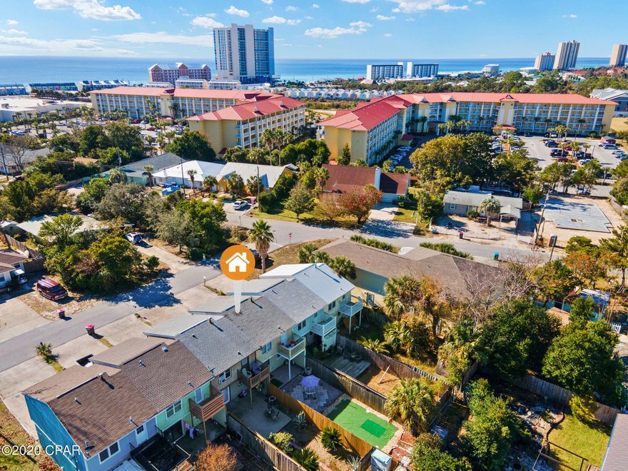 Currently under contract, seller accepting backup offers. Great rental investment opportunity, year-round living or weekend get-a-way! Short term rentals allowed!! This townhouse is just a few blocks from the Emerald Green Waters of the Gulf of Mexico and located within close proximity to everything including entertainment, restaurants, shopping, Wal-Mart and Pier Park. Townhouse features 2 bedrooms, a balcony overlooking the backyard, 1.5 baths, eat in kitchen overlooking the fenced backyard. No HOA fees. All information is approximate, if important to buyer, please verify.