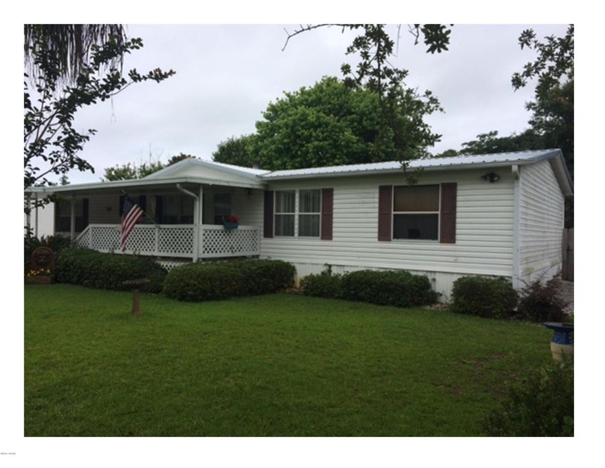 Nice 3 bedroom manufactured home with above ground pool. New roof in 2016! Would make a great short or long term rental only a short drive to the beach. Located on a dead-end street, very quiet neighborhood. 11 X 20 Storage shed in the back with Air conditioner.