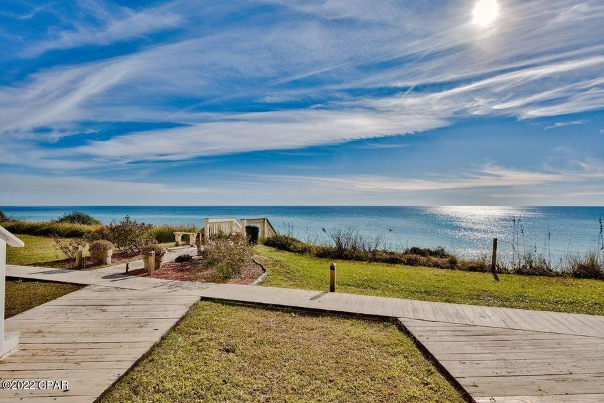 Fully renovated in a low density community, this impeccable first floor condo has stunning views across the white sandy beach and shimmering emerald Gulf.