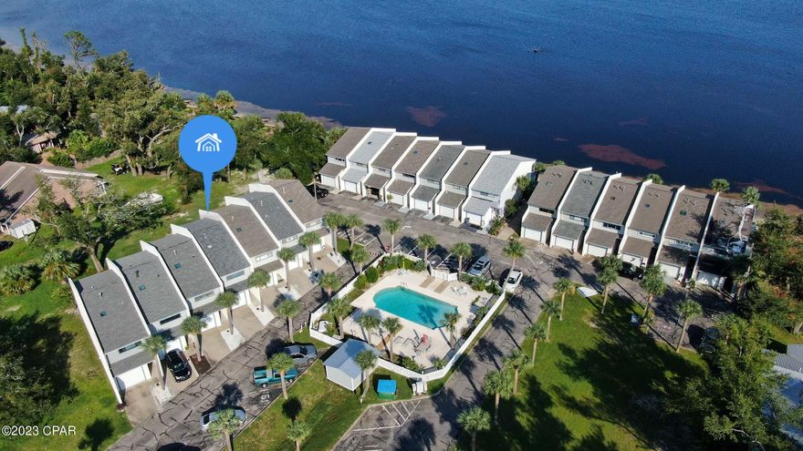 In a world where LOCATION IS KEY, your new home is perfectly positioned with views of East Bay & giant oak trees from the master bedroom (featuring a private balcony), living room, extended patio, pool, and the beach access that Sunbay Townhomes offers. This ensures that your home will always set a relaxing tone at the end of your busy day. Even better, you'll be living across the street from a great restaurant, a unique coffee shop, only 5 minutes from Tyndall AFB & the Callaway Boat Launch, and 20 minutes from Mexico Beach! Let's not forget, the home has a newer roof and AC, new water heater and plumbing, is located in FLOOD ZONE X (no required flood insurance,) and the Seller graciously paid your HOA dues of $100/month through the end of the year! Call us today for a private showing! 'CURRENTLY UNDER CONTRACT, SELLER WILL CONSIDER BACKUP OFFERS'