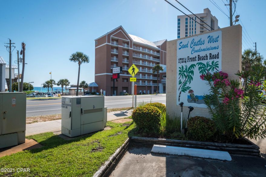New roof was installed late 2019, with average $30K potential income projection 2 Bedroom 2½ Bath, just a Short Walk Across the street to the White Sandy Beaches and Emerald Water of the Gulf of Mexico. The unit Features a large kitchen with Plenty of Cabinet & Counter Space, with breakfast bar, Laundry Room with Washer & Dryer, Dining Area, Spacious living room with custom built ins, Enclosed Sunporch, Fenced in Back Porch and Outside deck off the front Bedroom. This Small Complex includes 2 Pools, a Club House & Low Homeowners Fee. Located on the Popular West end of the Beach. Close to Pier Park, Shopping & Dinning. These units do not come on the Market Often. All ages, measurements and room sizes approximate. Please verify if important.