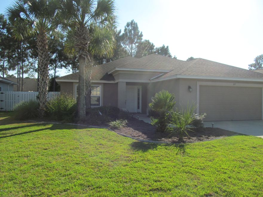 Very Nice 3 bedroom 2 bath home close to Pier Park- this home features open living space- with Foyer, den, living, kitchen and dining, also a screened in patio and fenced back yard.