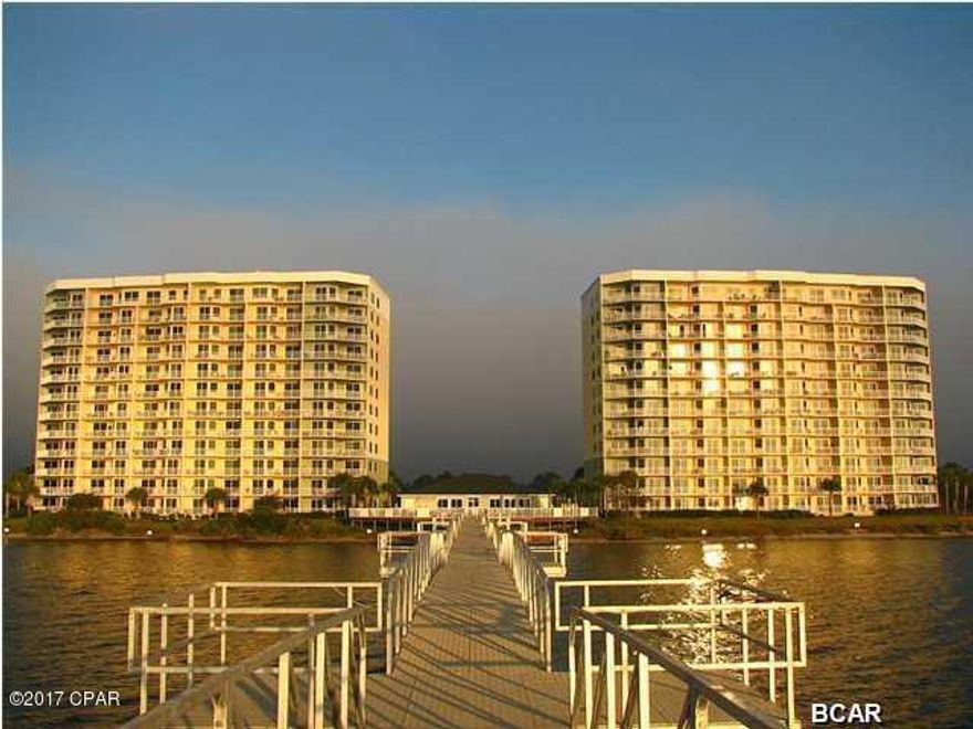 Hibiscus by the bay is a beautiful waterfront community with private marina. This condo is designed for recreational boaters and fisherman. This is a gorgeous waterfront property situated on an elevated 10 acre peninsula with 625 feet of water frontage. The property has its own 500 foot pier. This unit has been totally renovated  in the last year.The balcony provides expansive views of  St Andrews bay and the beach skyline.

A boat slip and garage is for sale separate from the condo. A double jet ski covered slip is for sale separate of condo sale.