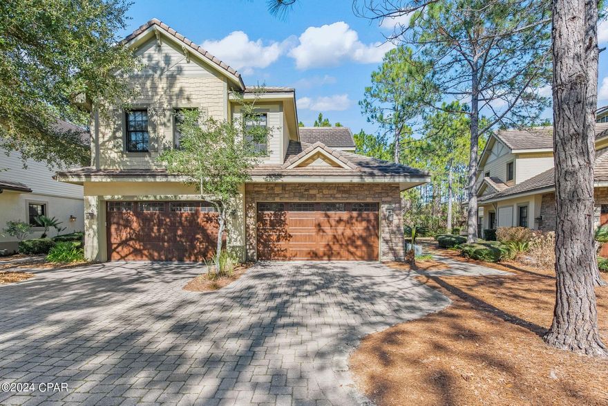 Stunning second floor, 2950 sq.ft. condominium, with PRIVATE elevator, is located in Wild Heron; a 732-acre 24/7 gated coastal sanctuary and one of the most sought-after communities on the Florida Panhandle. This Clubside One, single floor unit, is within a quiet, wooded community of sixteen luxury units constructed of concrete for strength and privacy. 
 
The extensive, luxurious home includes three bedrooms, three full baths and a bonus room that makes a great office or study. The expansive third bedroom can be easily transformed into a large media room or guest suite with a private sitting area. There are vaulted, and 10' ceilings throughout the home. An oversized, triple sliding door to the screened exterior Lanai makes indoor/outdoor living possible every day. This screened lanai has both wooded privacy and a view of the first tee box and driving range of the golf course.
 
This home is complete with a private elevator, two-car garage, and private side entrance and the home is move-in ready. The vast number of recent upgrades include a cook's kitchen with quartz countertops, Zellige backsplash, all new KitchenAid appliances including an induction range as well as a Kohler workstation sink & faucet and all new hardware. 
 
The newly remodeled primary bathroom includes new plumbing fixtures, lighting, quartz vanity tops, new tile, zero-entry shower as well as a new skylight. All additional bathrooms have also been upgraded with new fixtures, faucets, lighting, hardware and vanities. 
 
In addition, there is new carpet in all bedrooms, recessed lighting in the living room, new ceiling fans, and a new laundry room sink and faucet with a built-in folding table. All appliances include the refrigerator, second full-size refrigerator in laundry room, and washer and dryer convey.
 
Located conveniently across from the acclaimed Greg Norman designed Watersound Club at Sharkstooth Golf Course, minutes from 30A beaches, and Pier Park, this exclusive gated community has it all. Wild Heron is located on the shores of Lake Powell, the second largest brackish lake in the world. Wild Heron truly is a coastal sanctuary. Amenities include a large, heated community pool, hot tub, large gym, boathouse, boat dock, fire pit, trails, event lawn, and others. Wild Heron is a very social neighborhood with summer concerts, holiday parties, weekly food trucks and farmers market, yoga, dance exercise, water aerobics, and many other activities. 
 
Watersound Club is available to join and includes not only the acclaimed Greg Norman designed Sharkstooth Golf Club, but access to the new David Love III designed golf course located just outside of Wild Herons back gate, the Tom Fazio designed Camp Creek golf course, Camp Creek resort and gym, the Watersound Beach Club, and on-site clay lighted tennis courts.  We are only a few minutes from Beach access 87 which is right down Kelly Street. The sunsets on Lake Powell are stunning and fishing, boating, kayaking and paddleboarding are activities made easily available through Wild Heron.