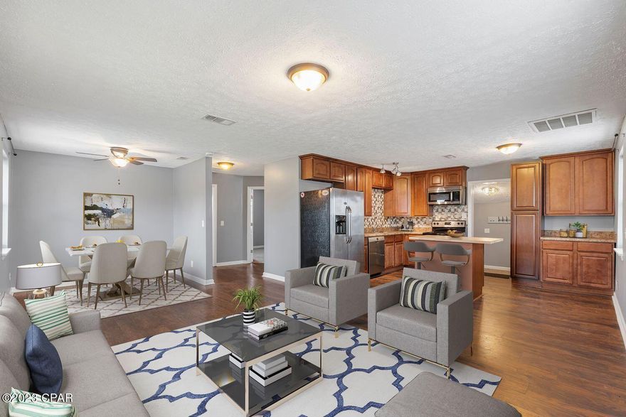 Come see this adorable Lynn Haven charmer,  on a huge corner lot, perfect as a starter home, investment property, family home, at an incredible price. 2 bedrooms and 1 bath in main area of home, and a large addition with full bath at back of home. Stainless steel appliances convey including a Bosch dishwasher, and brand new GE full size state of the art washer and dryer set.
The back yard is fully fenced, includes new Trex deck out back door and a yard building that is in new condition, for storage or even a play area, she-shed, etc.
This home has had a new roof in 2019, new PEX plumbing in 2014 and electrical upgrade in 2014.   Move in ready! Located close to everything. 15-20 minutes to Tyndall and 15-20 minutes to the beaches and Pier Park shopping! All sizes and measurements are approximate-buyer to verify if important.