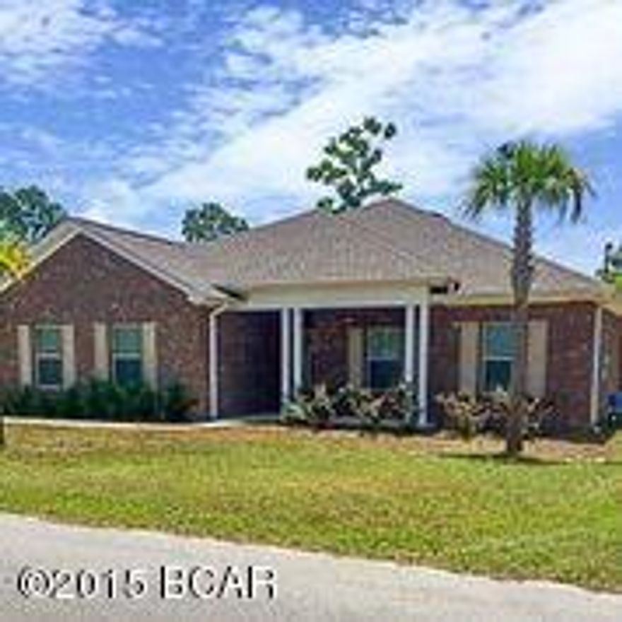 Custom Built Home nestled in Northwood Estates just off of North Lagoon Drive.  This Beautiful 4BR/2BA home w/2 car garage has so much to offer.  Geo Thermal Heating and Air for reduced Energy Cost, Irrigation system, Storm/Hurricane rated windows, All Brick, Spray Foam Insulation for Higher Energy Efficiency, Bamboo Flooring and Custom Built Playground in Back yard.  Fully equipped Kitchen, Washer/Dryer connections, large back porch area for relaxing. This is a must see.  All dimensions are approx.