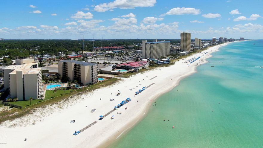 CURRENTLY UNDER CONTRACT, SELLER ACCEPTING BACKUP OFFERS * Top of The Gulf Condominiums FULLY furnished efficiency unit Affordable investment & dream vacation home in the world's most beautiful beaches – Panama City Beach! GREAT opportunity to your own piece of paradise with GULF views! Cozy unit but can sleep up to 6-guests with 2 queen size beds and sleeper couch. Tile floors thorough with breakfast bar, granite countertops, full size stove with smooth cook top and new bathroom vanity. The complex has just been approved for VA financing (primary residence). Top of The Gulf Condominium had several upgrades in the past year, including NEW exterior doors in all units, complex wide wi-fi, gulfside pool & kiddie pool resurfaced in November 2017 with night time lights, revamped poolside snack bar, canopied sitting area close to the beach, sundeck updated, new furniture, throughout the complex, gazebo, remodeled restrooms in the lobby, covered smoking area, new picnic tables. The low HOA monthly fees of $340 includes Insurance, grounds keeping, security, community room, shuffleboard, exercise room, two observations decks facing the Gulf, picnic area with community grills, Pest Control, Trash Disposal, TV Cable, water and sewer. Owners receive 2 owners passes and 4 owners bands for owners approved family members to use. Owner's Pets Allowed. GUESTS: $20 required Resort pass that includes parking for one vehicle and up to 4 armbands for guest stay. All measurements are approximated. Buyer to verify if important.