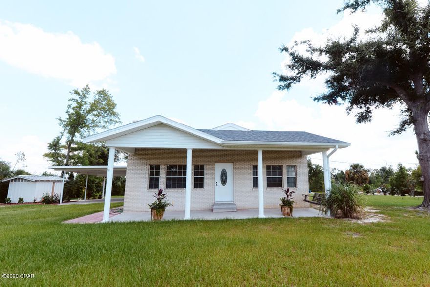 'CURRENTLY UNDER CONTRACT, SELLER ACCEPTING BACKUP OFFERS.  Bring your HORSES...No deed restrictions...room for a garden, pool, you name it!  This charming home has been completely redone...New roof, new carport 2019,New well, HVAC and water softner 2018.  Septic and drain field 2014 PLUS a termite bond and stainless appliances. Beautiful original hardwood floors and crystal glass door knobs.   Fish in your very own pond or swing on your covered porch! Outdoor storage shed, screened-in rear porch too!  Convenient to the 23rd Street corridor, Winn Dixie, Eastern Shipbuilding and Tyndall AFB.