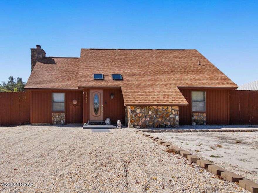 Under Contract - Taking Backups the phrase 'CURRENTLY UNDER CONTRACT, SELLER WILL CONSIDER BACKUP OFFERS Short term rental allowed!! Less than 5 minutes to the white sandy BEACH!  Conveniently located to many local restaurants, grocery stores & shopping. Home is a 2 bedroom, 2 ½ bath and has a Pool, Jacuzzi, Washer/Dryer, Garage and 2 Utility buildings. (All included!!) The backyard is completely fenced in, the front has plenty of parking. The home has a New roof (3 ½ years old), new A/C (3 ½ years old), new water heater (3 ½  years old). The house is Move in ready and the home is NOT located in a flood zone! This this in unincorporated Bay County and no HOA.