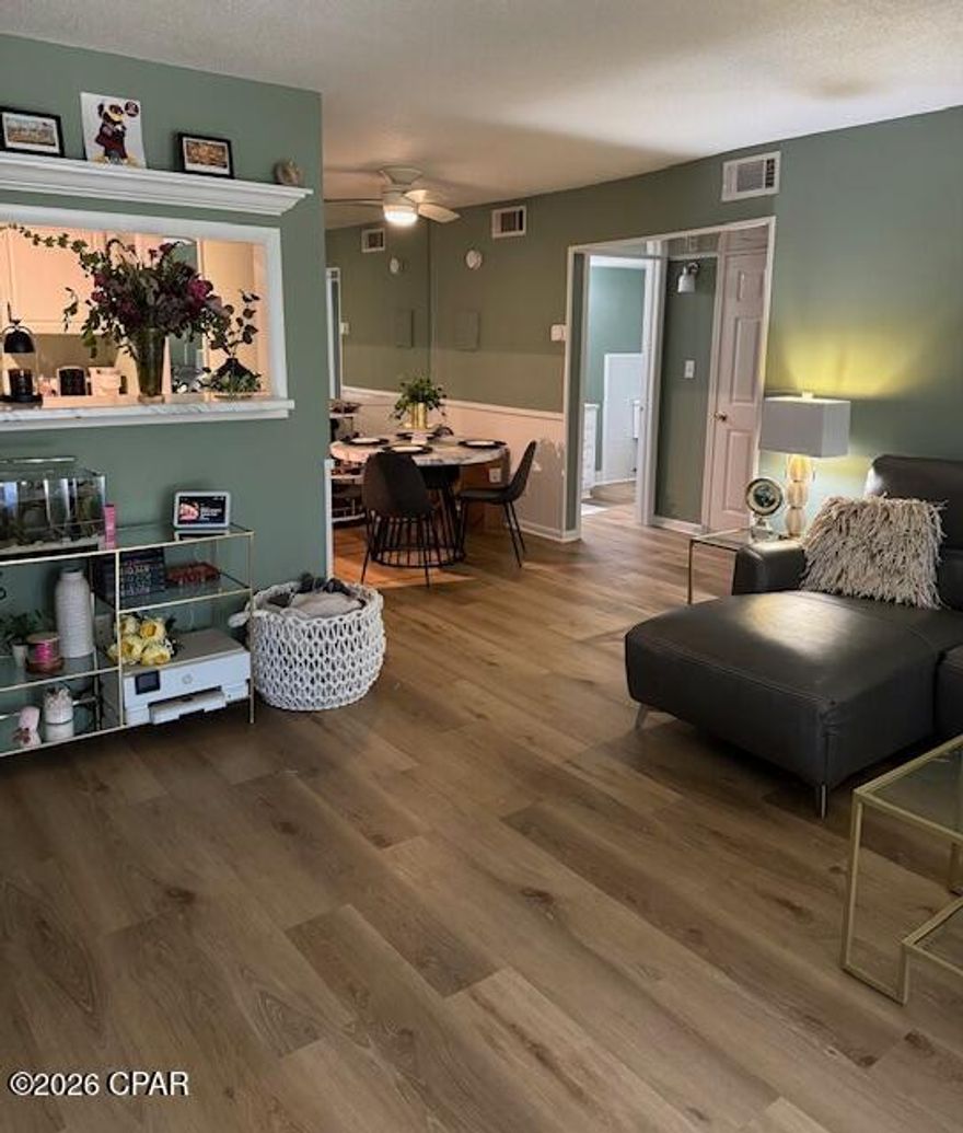 RENOVATIONS COMPLETED and WOW! . New flooring! New paint! New countertops! Landmark Condominiums on Saint Andrew at an affordable price, your own piece of paradise! This pristine, beautiful condominium property offers a private beach, two community pools, a workout facility, outdoor grills and sitting areas, and even an owner's storage closet conveniently located outside the unit for extra storage space. The open floor plan and well-designed kitchen/dining area give you plenty of space for entertaining. And there is even an outdoor sitting area to enjoy the peaceful morning or to unwind in the afternoon. Just minutes away from dining options along Harrison or Beck Avenue, or venture on to Panama City Beach for the white sand beaches and emerald waters of the Gulf of Mexico.