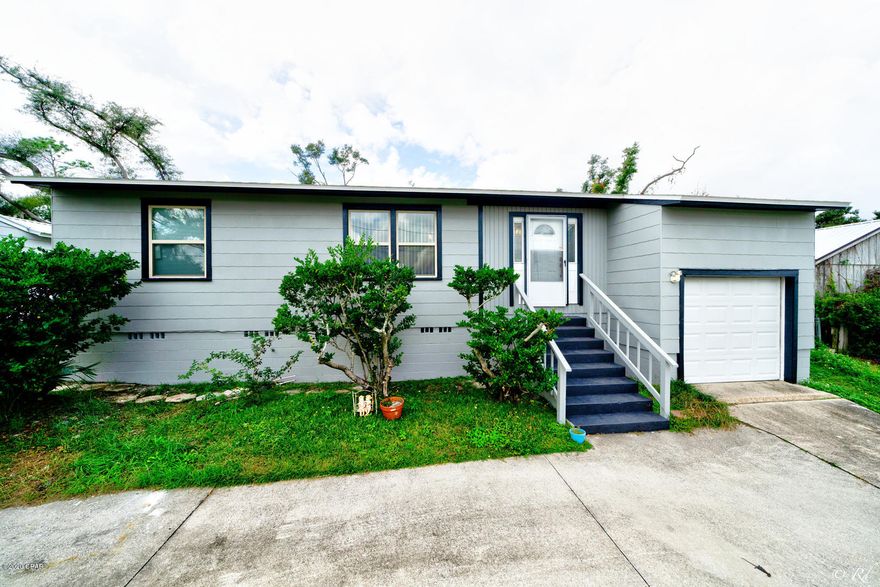 Adorable 2 BR/1 B  Florida Cottage in the much sought after Cove area of Panama City. Walking distance to St. Andrew's Bay and ''downtown'' Panama City. New vinyl Plank Floors throughout, an interior laundry room and office area attached to the living room. New A/C, roof, paint, and some windows. Recently remodeled kitchen. Single car garage. Covered 10X10 patio. Large lot. Turn key and move in!!