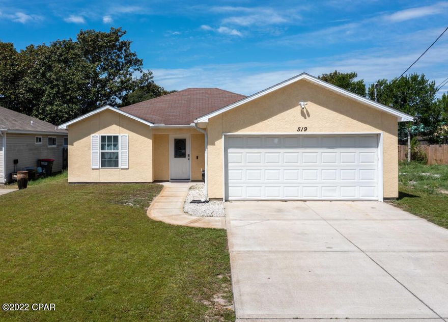 CURRENTLY UNDER CONTRACT, SELLER WILL CONSIDER BACKUP OFFERS.519 Camelia st., 3beds, 2Baths, 2 car garage, fenced backyard, less than 3 miles to Pier Park, and located approximately 400 yards from the nearest beach access. This home provides 1,280sq.ft of comfortable living space perfect for entertaining family and guests. Camelia Street is located South of PCB PKWY, close to restaurants, beaches, shops, schools and golf. Updates include - LVP floors, interior and exterior paint. Irrigation system with a well. The interior is very well kept, and the house is spotless. The kitchen has stainless appliances and is open to the family room. No HOA fees, no flood insurance, this one checks the boxes! Investment property, primary home, second home, bring the flip flops, enjoy sunsets and salt air