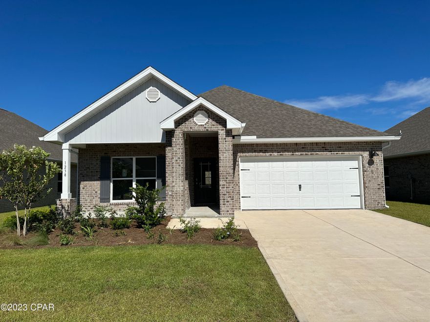 Andrews Park is centrally located off 389 in the very desirable area off Lynn Haven. Our Rhett floorplan is all brick, 4-bedroom 2-bath, it is an open concept floor plan, with a boasting 1,835 sq.ft. The Rhett floorplan has upgraded finishes throughout. You will find 9-foot ceilings with 10-foot trays and beautiful crown molding. The Rhett also has LVP flooring, granite countertops, a large kitchen island with cabinetry on both sides underneath and brushed nickel hardware. This floorplan has energy efficient windows to allow lots of beautiful natural light. The primary bathroom has a beautiful garden tub, perfect for relaxing, and a spacious walk-in shower with a glass enclosure.