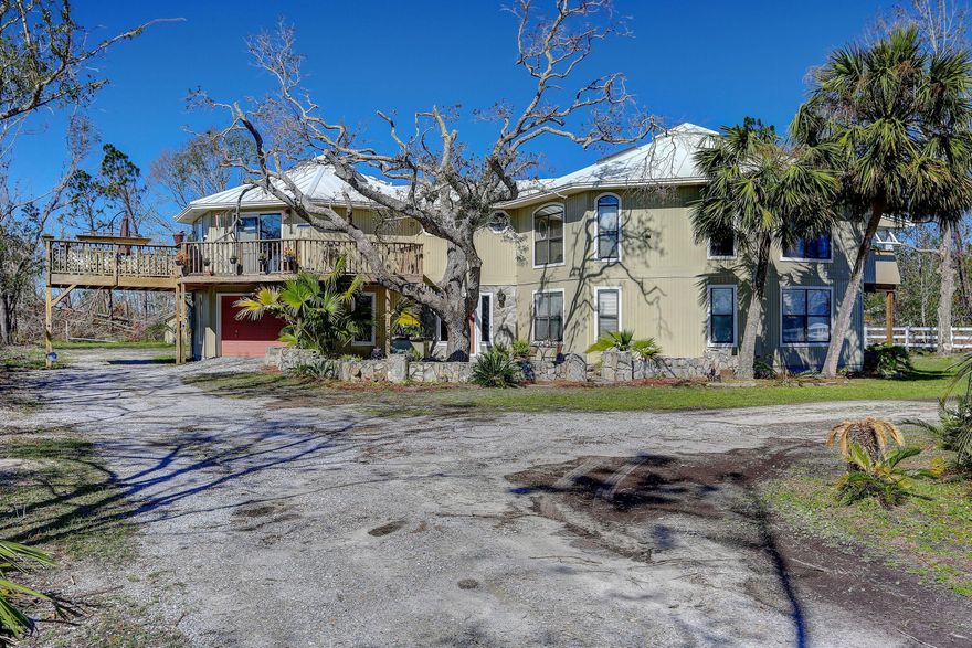 If you are looking for some space? This is the home for you!! This is a beautifully designed unique home with room and entertainment in mind inside and out!! 32 X 26 LARGE GAME/FAMILY ROOM FOR ANY EVENT!! ALSO INDOOR SAUNA ROOM 8 X 5  PLUS  A 30 X 40 WORK SHOP!!!Per the seller...New lower kitchen cabinets, granite counter tops, new kitchen back splash, new tile in main bath, new sink and vanity, new toilet, new carpet in two bedrooms, new entry door in upstairs foyer, new entry door into garage, fresh paint in kitchen, dining room, main bath, and two bedrooms.2 new HVAC systems, 2 new hot water heaters. From the top balcony you get a beautiful view of Deerpoint lake!!! ALL SIZES AND INFO ARE APPROXIMATE, BUYER TO VERIFY IF IMPORTANT.