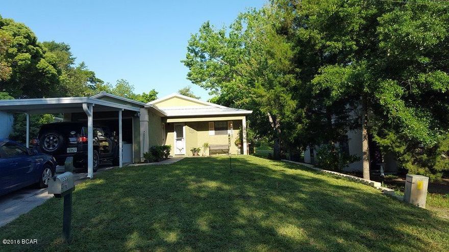 Charming Cove cottage that is move in ready.  Tastefully decorated and updated. Major updates include new HVAC, Metal roof, Water Heater, Garage door all within the last five years.  Hurricane shutters on all windows and a hurricane proof front door. Large 12x20 outdoor shed in back yard for storing your equipment.  Fenced back yard with alley access.  Screened porch is perfect for enjoying your evenings and soon you will love the cute fire pit for cozy nights by the fire. Termite bond in place as well. Owners are leaving Refrigerator, Washer/Dryer and Patio furniture including fire pit.