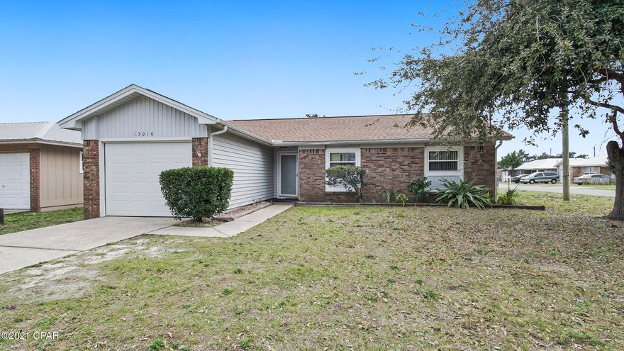 Centrally located, on a large lot, this beach home has a new roof and is move in ready with  plenty of room to expand for a large family or add a pool in the backyard. This home offers 3 bedrooms and 2 baths plus a single car garage for your car or storage.  Your children can conveniently walk one block to school at Beach Elementary and the middle and high schools are within a few miles for quick drivability and access.  Wonderful location close to the beach, the County Pier, shopping, Pier Park and Frank Brown Park for all your extracurricular activities.  Short term rentals are not permitted in this area. This house will not last long, so call today for your own private showing. Please verify room measurements if important.