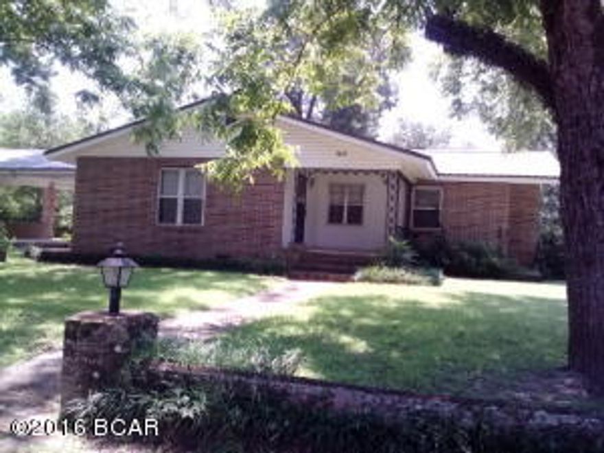 Charming older home in a great location.Home has 3 bedrooms , with 3 full baths.Large living area at the front and a beautiful New 420 sq. ft.sunroom with kitchen, t on the back of home for entertaining family and friends. Sunroom has beautiful all wood ceilings,walls,cabinets with tile floor.Home has been freshly painted and all New floor covering and updated wiring. Laundry room with sink as you come in from carport.New metal roof and a/c unit and appliances in the past 7 years.Big chain linked fenced back yard with workshop / large attached pole barn like shed. Has a well for outside watering and several pecan trees ,grape vines and fig tree. Owner has had beautiful gardens in the past in back yard. This home is in excellent condition. Don't let the outside of this house fool you it has lots of room for a growing family .Call for your appointment today. All room measurements are taken from a third party , if important please verify