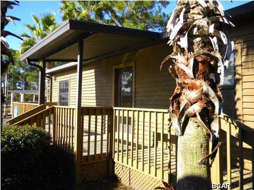 Have you seen Emerald Pointe lately? This neighborhood is wonderful. Well-kept, neat and tidy. And what an incredible location, close to the beach, shopping, restaurants and close to Hathaway Bridge to get to town. This modular home was just renovated and is move-in ready. With 948 sq ft, 3 BR's, 1 bath, living room, kitchen with dining area and screened porch that looks out over the pond in back. This would be ideal for an inexpensive vacation home, retirement home, first time home, rental/investment property...it's ideal for almost anything! So don't wait, make an appointment to view this one, you won't be disappointed. Emerald Pointe is a gated community with club house/community center, exercise room, pool, lake...lots of nice amenities in a really nice location. It will make