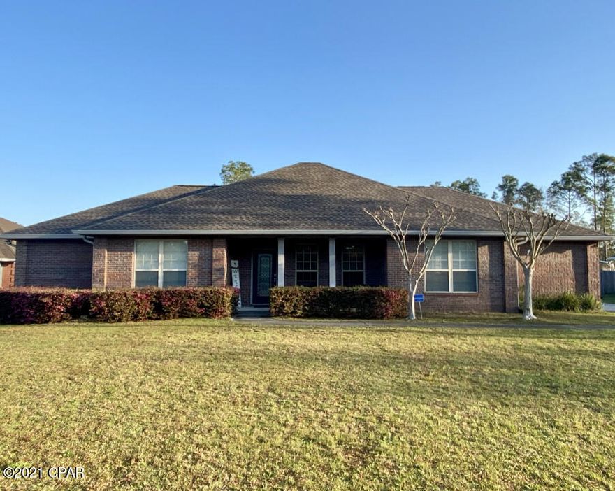 This beautiful all brick home is located in the popular W. Oaks neighborhood. It sits on .78 acre lot with irrigation system. As you enter the home, you are greeted with a warm foyer with the formal dining room to the right and the living room just ahead. The laminate floors give the look of hardwood. The living room opens up with two bedrooms, bonus room and a bath to the left and the kitchen and breakfast nook to the right. The 9' ceilings make the area for spacious. Beyond the kitchen and dining room is the master suite. The master bedroom is spacious and large enough to handle a king size bed and all accessories. The master bathroom has a jetted tub, separate tile shower, two walk- in closets and a large vanity with double sinks. Off to the side of the master is a small office with outside entrance. With this split floor plan, both adults and young ones will have their private space. The kitchen has corian countertops and all stainless steel appliances. The laundry rooms is larger than most with built-in cabinets and sink. Can also accommodate a large deep freezer. Additional features include: security system, crown molding, surround sound and built-in entertainment system. Great family home with no HOA to enjoy your home and land.