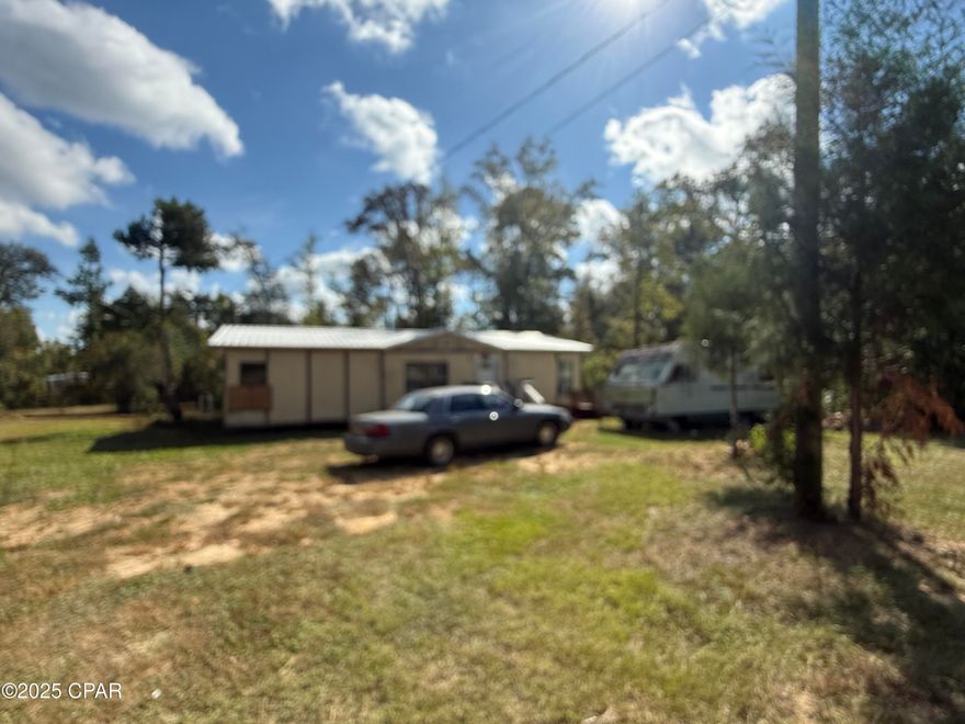 ApproximatelyTwo Acres on Riverbend Rd with a 1987 Mobile Home.  Mobile Home is in need of much repair work throughout the inside.  The roof is fairly new.  Need notice to show, and buyer should verify all measurements.  Lot Size is irregular as it follows the road curvature.