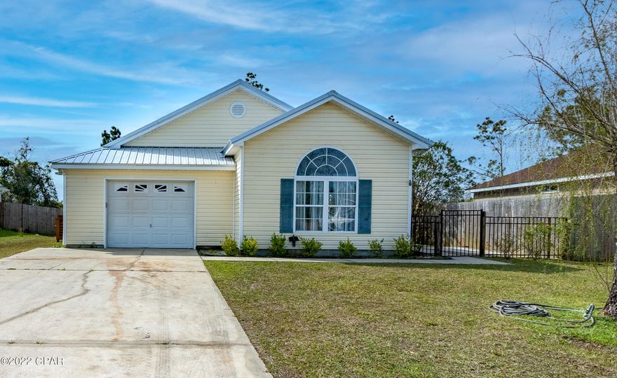 ADORABLE 3/2 IN A HARD TO FIND PRICE RANGE UNDER 210K. GREAT STARTER HOME OR IF YOU ARE LOOKING FOR RETIREMENT. GREAT NEIGHBORHOOD AND LOCATED CLOSE TO TYNDALL AFB OR TOWN. FRESH PAINT AND LAMINATE FLOORING. MOVE IN READY WITH A GREAT BACKYARD. THERE IS A NICE STORAGE SHED IN THE BACK FOR EXTRA STORAGE AND A GATED SIDE YARD FOR PLANTS AND GARDENING. PLEASE VERIFY ALL IMPORTANT INFORMATION.