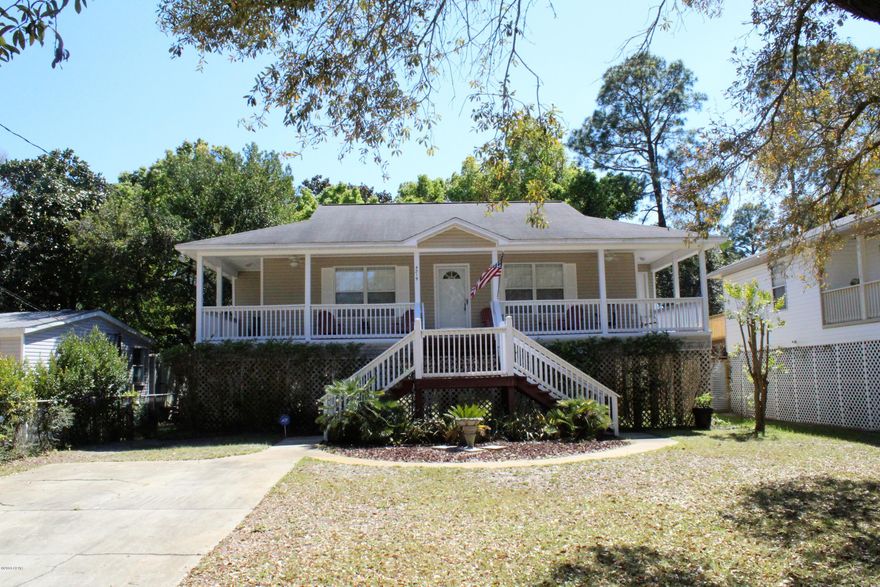 Come See this fabulous Location, beautiful Home with Boat Ramp Access in Waterhaven.  Beautiful 3 bedroom 2 full bath home with lovely front porch to sit and relax on.  Kitchen has lots of cabinetry, pantry and updated appliances.  Family Room Dining Room Kitchen all open which would be great for entertaining.  Master Bedroom Suite with Walk In Closet, Master Bath includes double sink and tub/shower combo.  Separate Laundry Room. This home has lots of windows which makes it light and bright.  You can see water at the end of the street.  MUST SEE!! Excluded items, big picture in bedroom, picture of sellers on pier hanging in hallway, bose radio, coral on a wooden stand sitting under the tv in living room, printer.