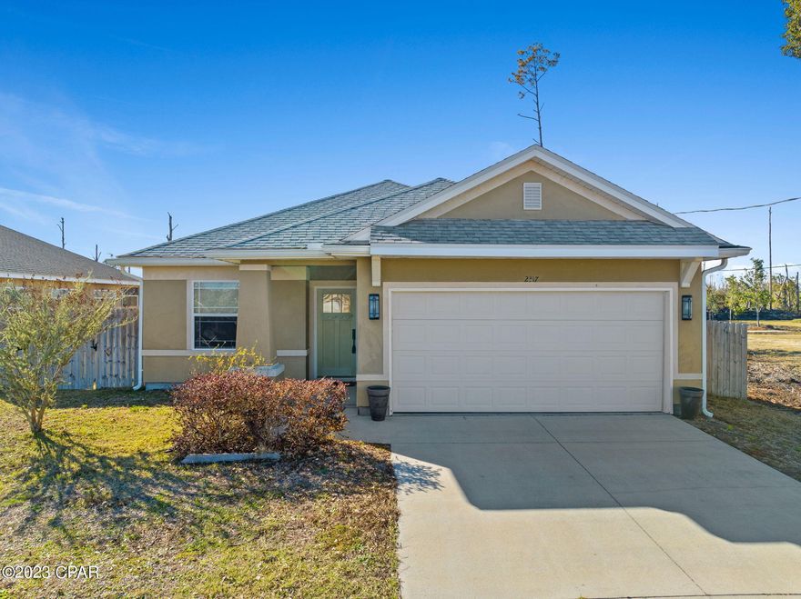 This craftsman style home is tucked away for peace and quiet but conveniently located to everything.  Tyndall Airforce Base is just 10 miles away and our beautiful beaches are 13 miles away.  This home offers 3 bedrooms, 2 full baths, a screened back porch, a large fenced in back yard and a 10 x 12 aluminum shed located at the back of the property.  The home has new LVT flooring through out the kitchen, dining and living room areas, ceramic tile in the bathrooms and new carpet in each of the bedrooms.  Additional features:  All new appliances (less than a year old) in kitchen, remote control ceiling fans, new outlets and switches (to include USB in the living room) and blue tooth speakers in the bathroom vent fans.