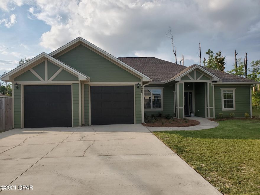 CURRENTLY UNDER CONTRACT, SELLER ACCEPTING BACKUP OFFERS Extraordinary opportunity to own a custom built home on a large lot with no HOA! Contractor/builder was the only owner since construction!  Just about everything will have been made like new again - freshly painted inside & out, new carpets & gorgeous engineered hardwood flooring going in, granite countertops, custom solid maple cabinetry, new butler's pantry, 4th bedroom addition, landscaping, custom garage storage, new roof in 2019, outdoor shower, gutters, septic pumped & serviced in March '21, new mailbox!  This home is ready for you!  Location is ideal for travel into Panama City/Lynn Haven, Tyndall AFB, the Beach or into many other areas in the Florida panhandle!  Currently undergoing cosmetic refurbishments.