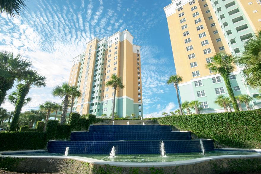 En Soleil is the premier condo living experience on Panama City Beach. Private parking under the building with conditioned lobbies to your unit.  Enjoy the best coastal living has to offer enjoy the gorgeous sunrises &  sunsets from the large Gulf Front balcony. The complex has a lagoon pool that is heated, gulf front fitness center, tropical landscaping, hot tubs, and 500 feet of our white sand beaches. A short drive to Pier Park with world class dining and entertainment. En Soleil is conveniently located within minutes of  golf, sport fishing, unparalleled restaurants, boutiques, and more. This unit comes with an assigned parking space (#68) in the parking garage located underground. Complex also offers  conditioned lobbies on each floor. 3 D scan. Furniture in office does not convey.