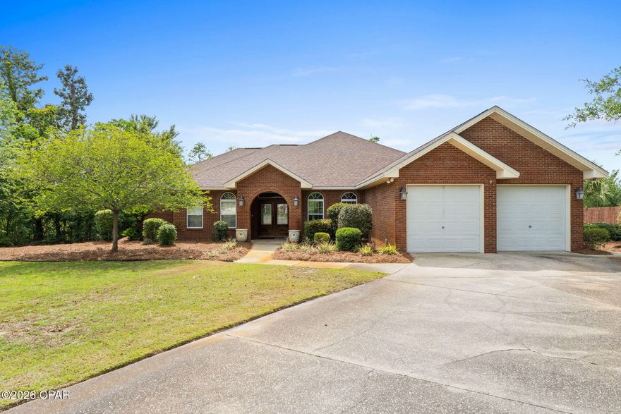Welcome Home! A stunning all-brick estate offering the perfect blend of timeless elegance, peaceful living, and modern comfort. Situated on over an acre of beautifully maintained property, this spacious 3-bedroom, 2-bathroom home boasts approximately 3,040 square feet of thoughtfully designed living space filled with character and charm.

Inside, you'll find elegant finishes throughout, complemented by beautiful antique fixtures that add warmth and sophistication to the home's unique character. Whether entertaining guests or enjoying a quiet evening in, this home provides an inviting atmosphere with generous living spaces and refined details at every turn.

Just outside of the fully heated and cooled Florida Room, Step into your own private retreat featuring a sparkling in-ground saltwater pool, perfect for relaxing after a long day or enjoying sunny Florida afternoons. Gather with friends and family around the custom paver fire pit area and create unforgettable memories under the stars.

For those who appreciate waterfront living, this property backs up to a canal with Gulf access and offers incredible potential for your very own private dock -- making it ideal for boating enthusiasts and anyone who enjoys life on the water.

Additional highlights include a new Culligan water filtration system, providing enhanced water quality and peace of mind.

Combining privacy, space, waterfront potential, and timeless style, 1112 Paton Lane offers a rare opportunity to own a truly special property in one of Bay County's most desirable areas.