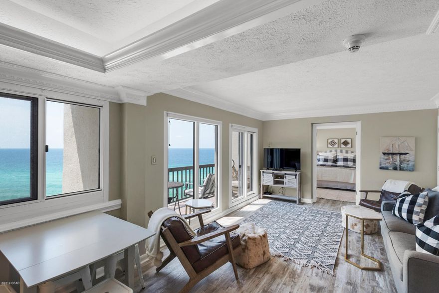 REDUCED!  This price is without the parking space. Parking space can be purchased separately  This beautiful 3 bedroom, 3 bath unit has the location you want at Pinnacle Port.  Gulf front views from the living room and master on the Main floor and one guest room on second floor. Lake Powell views from other guest room.  So darling you will not want to leave.  Please remember that Pinnacle Port has central heating and air so you only pay for lights.  No hot water heater either.  You will never want to leave it is so nice.  .