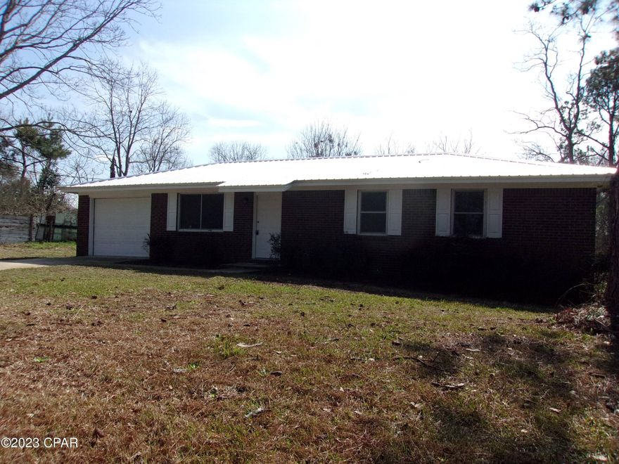 'CURRENTLY UNDER CONTRACT, SELLER WILL CONSIDER BACKUP OFFERS' Remodeled 3 Bedroom 1.5 Bath Brick Home on Lot in the community of Esto. Home is move in ready. New windows, roof, floor covering, fixtures, air conditioning system, stove, refrigerator, and completely repainted. Spacious living room and eat-in kitchen.  One car garage with laundry room in one end. Master bedroom has half bath with a closet making it possible to add a shower. Corner lot at end of street. Nice and quiet area in small community at the Florida/Alabama State Line making it possible to live in Florida and convenient to working and shopping in Alabama.  Ready for a new family or retired couple ready for the quiet life. Check it out today!!