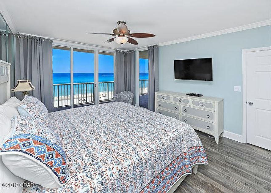 GORGEOUS 3BD 3BA END UNIT CONDO. PRIME PARKING SPACE ON 3RD FLOOR (SKYWALK LEVEL)!!!. This condo is FULLY FURNISHED & has everything you need! Breathtaking, panoramic views of the Gulf of Mexico abound from both the private balcony and the interior of this Majestic Beach condo. Enjoy spectacular Gulf Views from the main living area and Master Bedroom suite. This is an end unit with 3BR/3BA plus a bunk room.  Located in Tower 1 (west) and on the 4th floor this spacious unit has a large balcony – so wonderful to relax and watch the sunset! Majestic is a full scale resort and the condos here rent very well. Lower floors are extremely desirable. This condo could easily accommodate 10 or more guests Majestic Beach Resort amenities are among the finest with: 3 large outdoor pools, 2 large heated indoor pools, 2 kiddie pools, 3 hot tubs, H2O poolside bar & grill, Visions martini bar, market/deli/starbucks, state-of-the-art fitness center
with his/hers steam & sauna, owner's lounge with full size kitchen, 24-hour on-site security, 125 seat stadium seating movie theater/presentation center, conference center, tennis court and over 650' of white sandy beach. Located just a 5-10 minute drive to Panama City Beach's premier shopping and dining development, Pier Park. Call for your private tour today! All information is believed to be accurate and correct; buyer to confirm & verify if important.