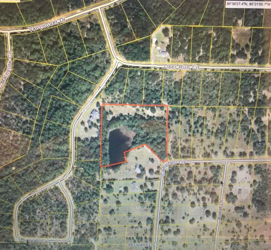 Nice building lot located in Compass Lake with small pond on it. This lot has +/- 3.4 acres and would be a lovely place to build a home as a great get away or live there.