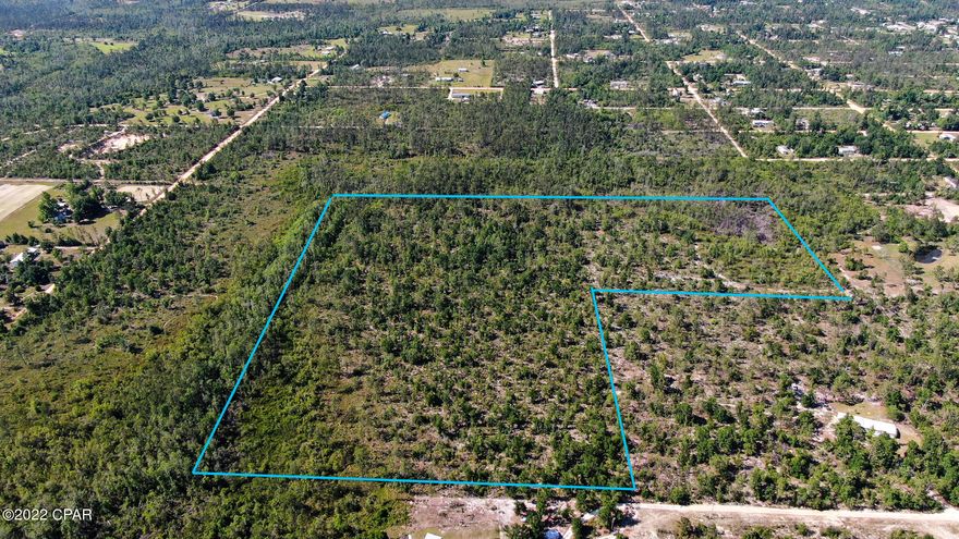 30 acres of vacant land close to Panama City Beach! This property is accessible by two roads and located just north of Hwy 20 in Fountain. This is the perfect place to build a home, place a mobile home, or just hold on to for investment. Currently zoned AG-1 with Bay County.  Farm animals are ok!  Fountain is located close to Panama City, Marianna, Dothan, and the beaches of Panama City Beach. All measurements are approximate, verify if important.