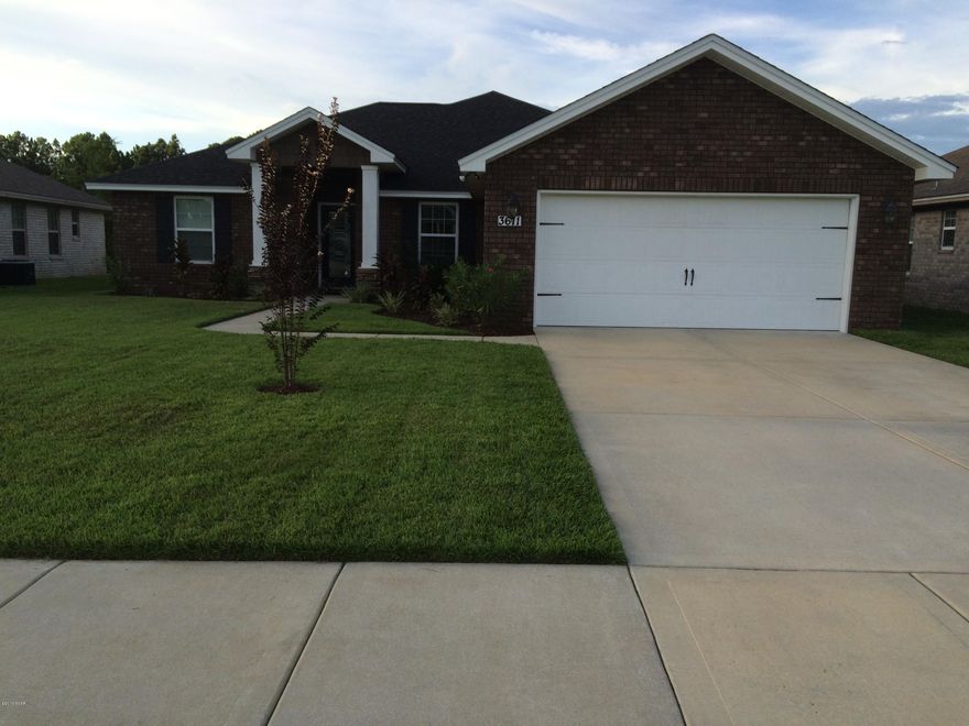 ***Newer brick home in Lynn Haven's Azalea Place***. Offers easy access to Panama City's main shopping corridor, Tyndall AFB, and the Naval Coastal Systems base. Interior features include laminate wood flooring in living/dining room, open living/dining room, granite countertops in both kitchen and bathrooms, large kitchen island and stainless steel appliances. Master suite includes tray ceilings, free standing shower/separate tub, double sinks, walk in closet, recessed lighting and crown molding. All brick siding, covered porch off both living and master, oversized backyard. Seller is a licensed realtor. Survey and transferable termite repair bond will be provided free of charge to buyers. All information is approximate and should be verified by buyers if considered important.