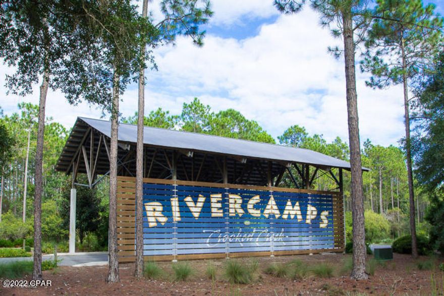 Are you looking to build your dream home in beautiful Neighborhood? This lot is great lot with distance Bay views too! Rivercamps on Crooked Creek is a serene neighborhood surrounded by three bodies of water with outstanding amenities including the Pier, boat ramp, boat storage, day docks, community pool, fitness center, water activities, nature trails, amazing sunsets and so much more. This wonderful community is also close to the Bay County International Airport, Beaches, restaurants, and Pier Park.