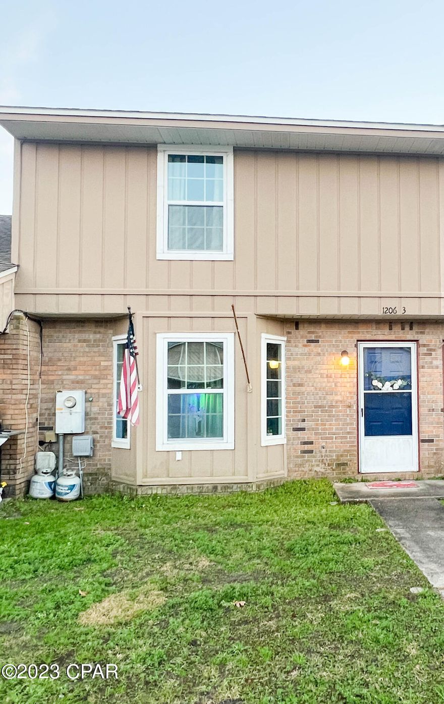 Don't miss this centrally located 3 bedroom/2.5 bath townhome in Panama City!  This updated unit received a new roof, carpet, ceiling fans, attic insulation, paint, windows in 2021, new vinyl fence in 2019 and new dishwasher and screen-door in 2023.  The first floor is open concept living, dining and kitchen with a half-bath for guests to use.  Upstairs you will find a master suite, 2 additional bedrooms and another full bath.  With no HOA, this can be a great first home or investment property/rental. Call today and schedule your showing!
