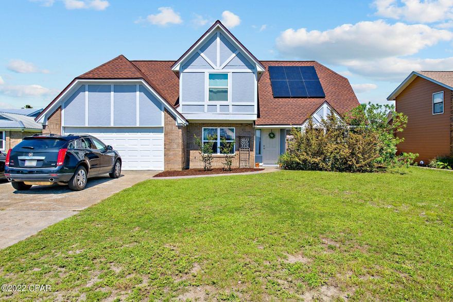 Sellers will pay solar panels off with full price offer! Enjoy LOW power bills! Don't miss this lovely 4 bed, 2 bath home conveniently located in Callaway near Tyndall air force base. Downstairs you will find the living room with a wood burning fireplace and high ceilings that make the room feel even more open. The kitchen and breakfast area are just off the kitchen with plenty of counterspace. There is an inside laundry area as well. The spacious master bedroom is downstairs with double vanity sinks and a walk-in closet! The formal dining area is currently being used as a playroom. Upstairs you will find 3 bedrooms and a shared bath. Enjoy a large fenced in backyard perfect for kids and animals to enjoy! Two car garage. This home has great personality and is ready for new owners!