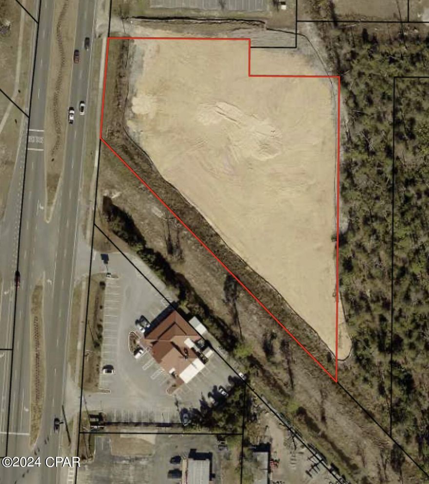 2.16 Acres of prime commercial land in the heart of Lynn Haven surrounded by dense population and a thriving retail district.  Development Order has been issued for development of an express carwash facility and a 3000 square ft retail building.  Sale includes all plans and engineering! Seller will consider lot split.