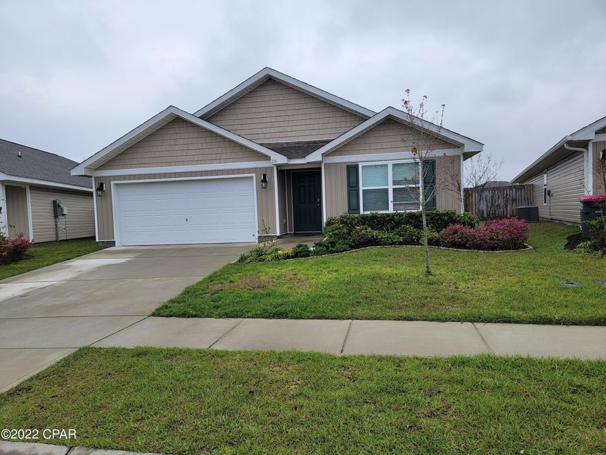 Bridge Harbor!  4 bedroom 2.5 bath home with 2 car garage, fenced and on a pond.  This home features an open floor plan with vinyl plank flooring throughout the common areas and carpet in each bedroom.  The kitchen is open and spacious with a  center island, Kinetico water filtration system and beautiful cabinetry.   The master bathroom has a separate shower and large soak tub as well as a large walk in closet.  ALL ELECTRIC!  Sprinkler system!  Community Pool and Mailbox.  Close to TAFB!