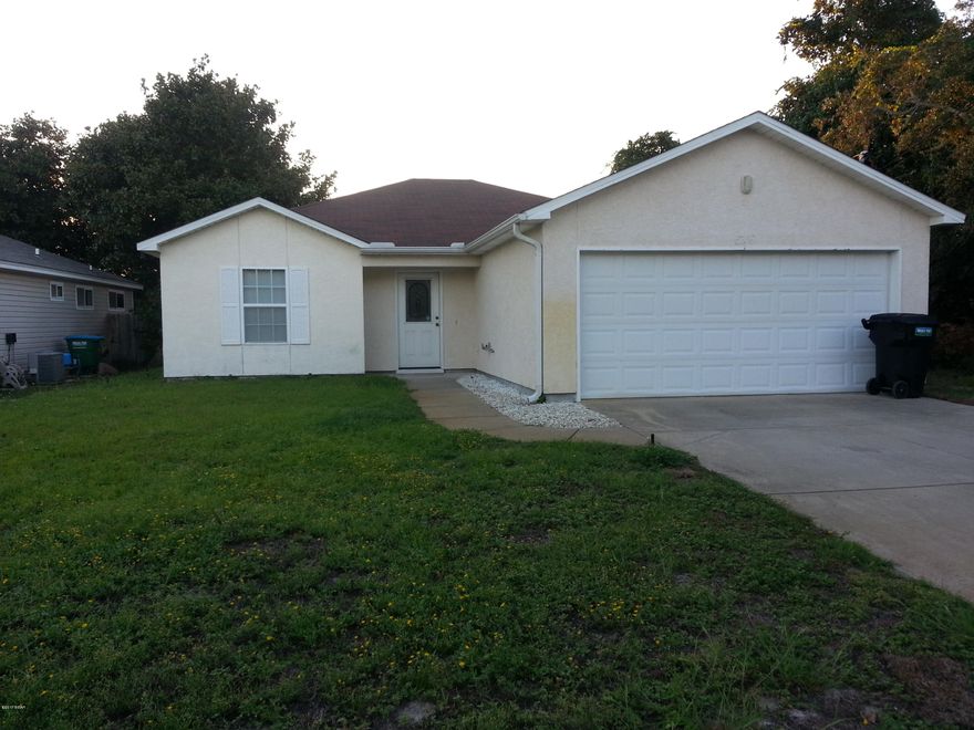 Beautiful 3 bedroom 2 bath close to beach, ceramic tile and carpet, breakfast bar, open floor plan, 2 car garage and sprinkler system.