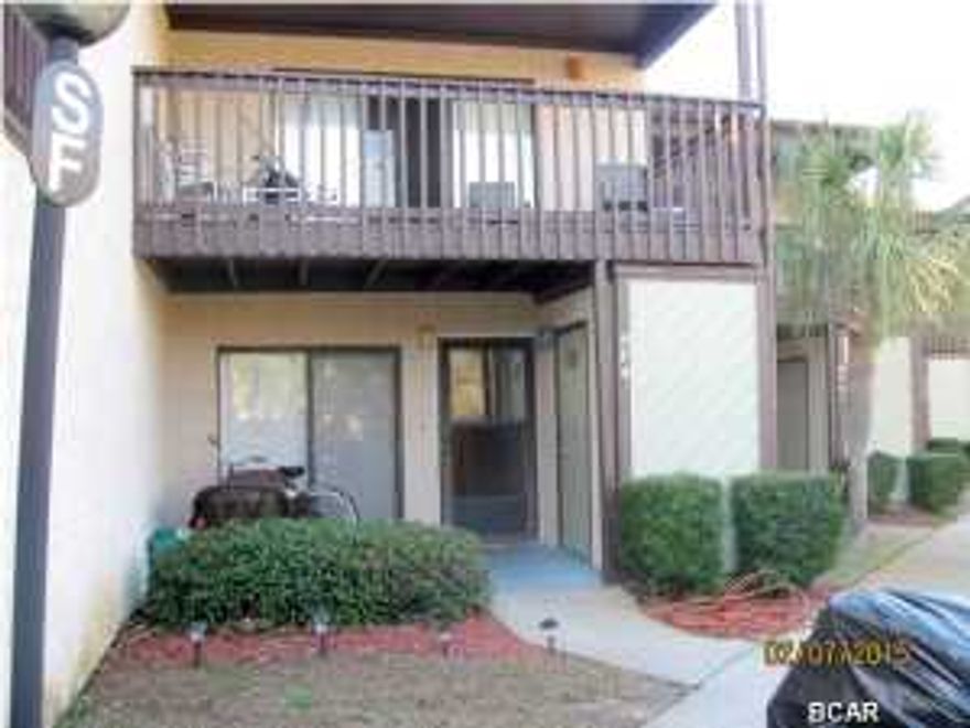Well kept by owner who recently painted and has replaced carpet & laminate flooring less than 4 months ago. New Water Heater also. Located at the front of the complex so it's a shorter walk to the beach. Main pool is just steps away. Updated Kitchen Appliances and Washer & Dryer are less than 5 yrs old. There is hallway access to Master Bathroom. Nice yard in back for private bar-b-quing and a great balcony to relax and feel those summer breezes. Perfect 2nd Home / Vacation Rental. Not far from the west end hot spot...Pier Park. Put this one on your list!